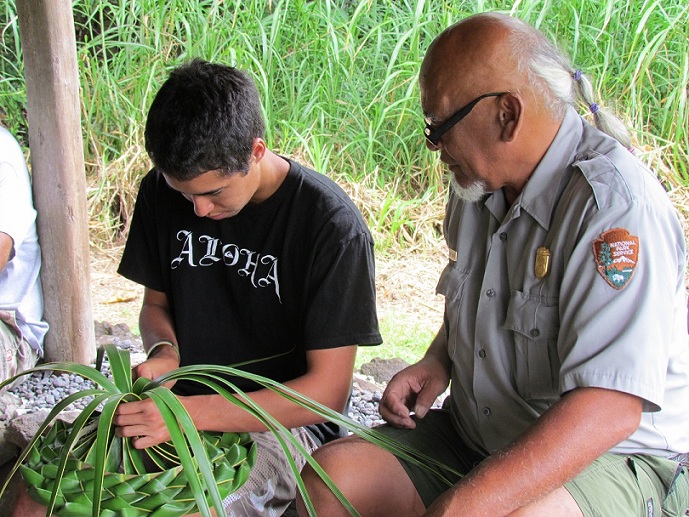 Ranger-guided coconut frond weaving 2 Ranger-guided coconut frond weaving 2