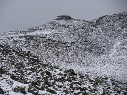 Looking up at the Red Hill observation shelter from the interior of the Crater with a light dusting of snow.