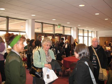 Ranger Roberts-Burton speaks with symposium participants.