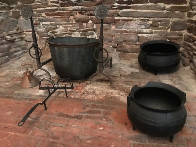 Iron pots from the 19th century located in the Hampton Mansion