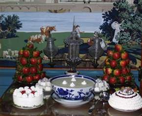 The sideboard in the dining room, set for a yule feast The sideboard in the dining room, set for a yule feast