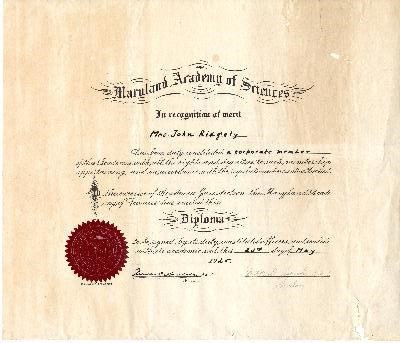 ellowish paper with blue writing and large seal in middle
