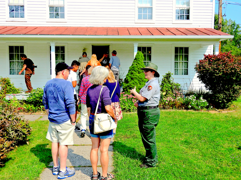 A park ranger gives a tour of the Harriet Tubman Home for the Aged at Harriet Tubman National Historical Park