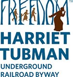Harriet Tubman guiding people through blue silhouette trees