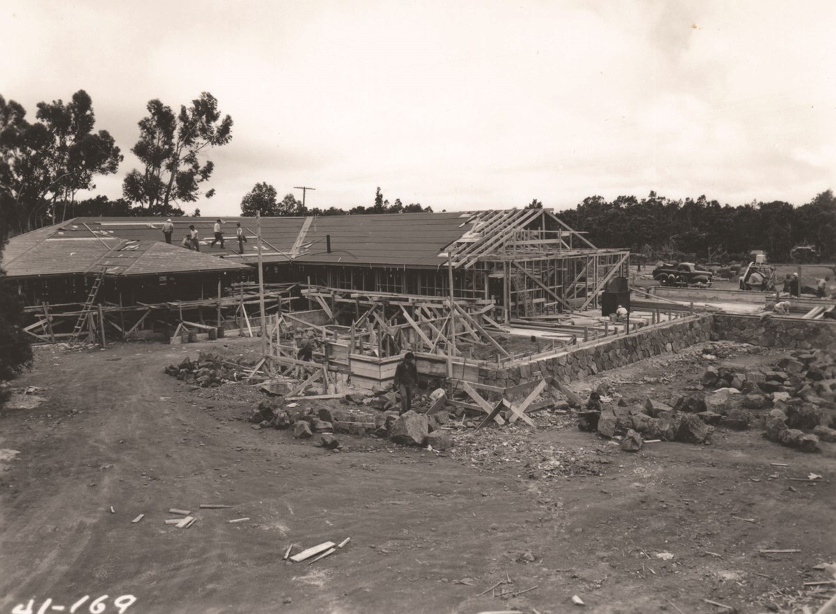 Black and white photo of a building under construction