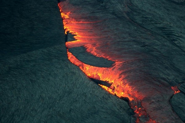 Crust on the surface of the lava lake turning.