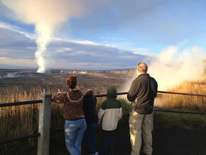 The Macfarlane family looking at Halema‘uma‘u