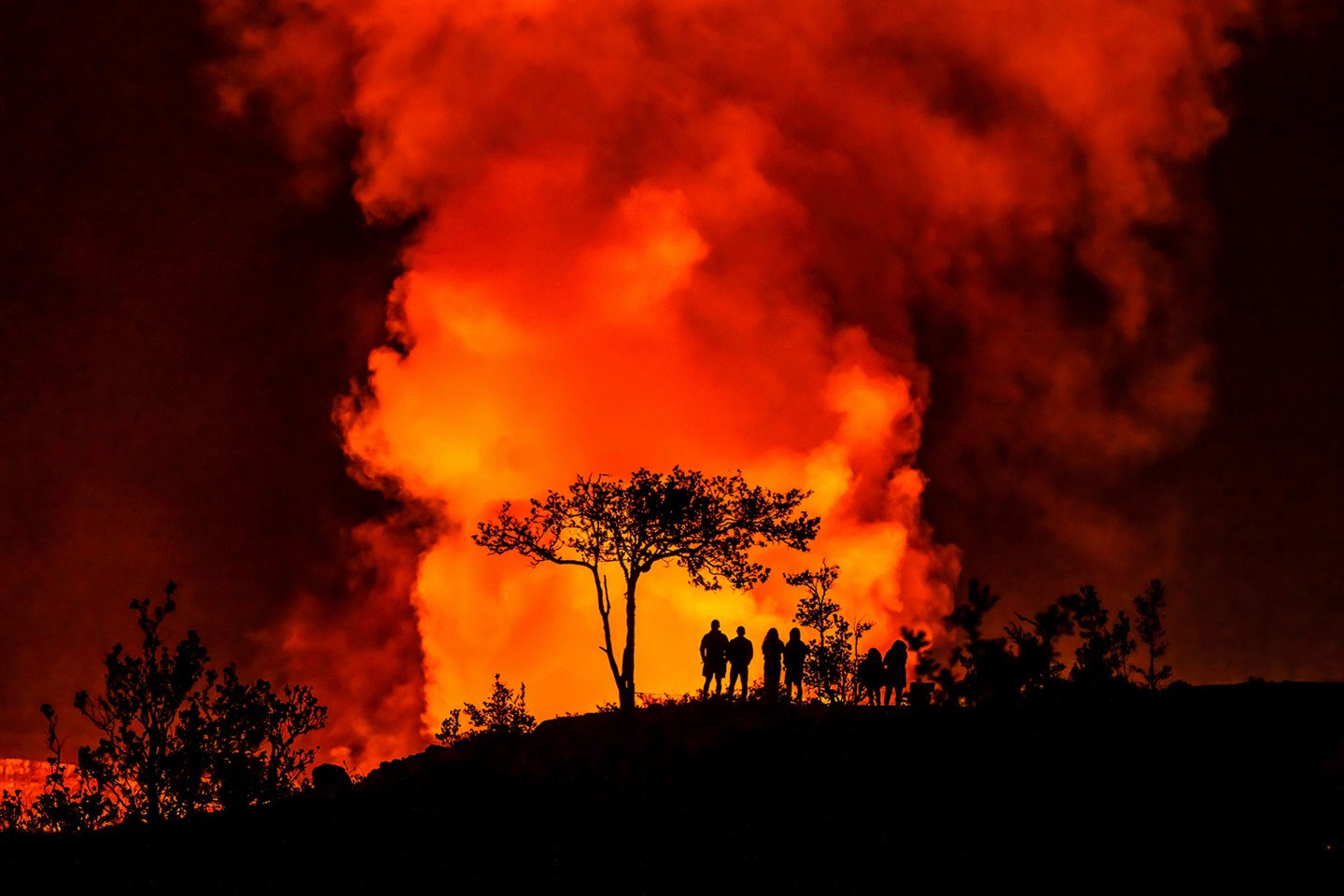 Lava glow illuminates the night sky