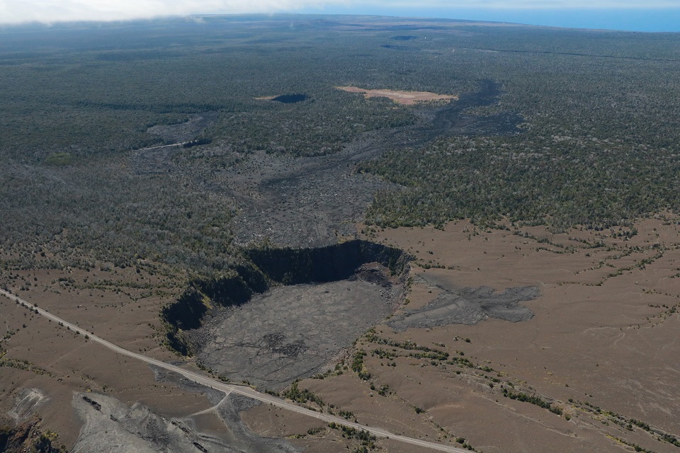 960-USGS_20200529_Keanakakoi Aerial_multimediaFile-2921 Aerial view of a volcanic crater and a road