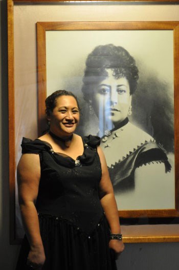Denyse Woo-Ockerman portrays Queen Emma