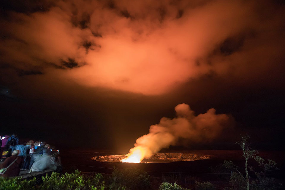 Visitors at Jaggar Museum overlook on Sunday evening enjoy the glow emanating from the lava lake deep within Halema‘uma‘u Crater Visitors at Jaggar Museum overlook on Sunday evening enjoy the glow emanating from the lava lake deep within Halema‘uma‘u Crater