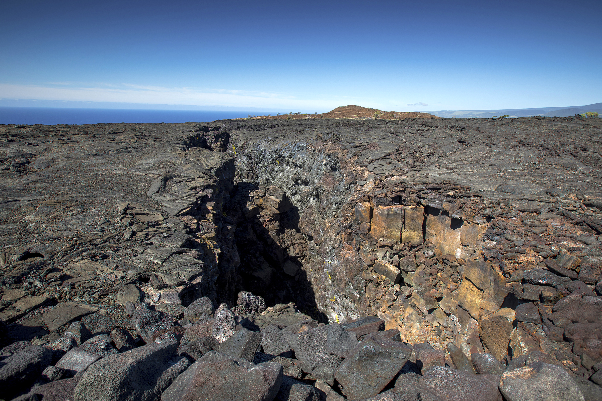 Close up of the Great Crack with a kīpuka in the distance.