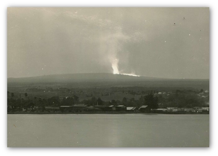 Kenichi Maehara photo of Mauna Loa erupting Mauna Loa volcano erupts from its summit in this black and white photo