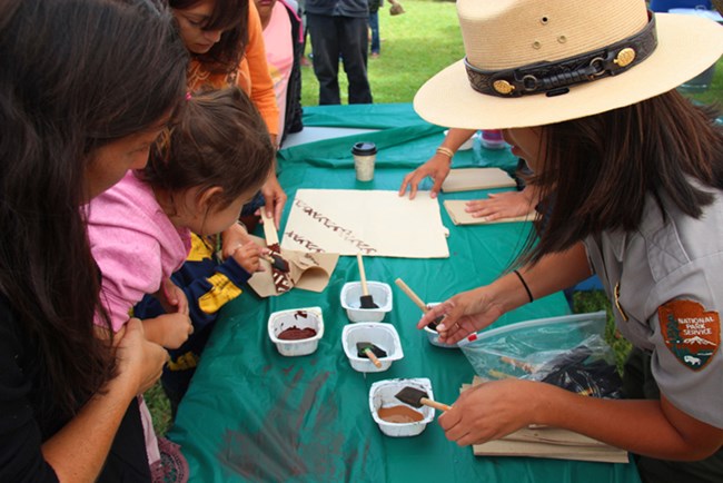 Ranger Rebecca demonstrates ‘ohe kapala