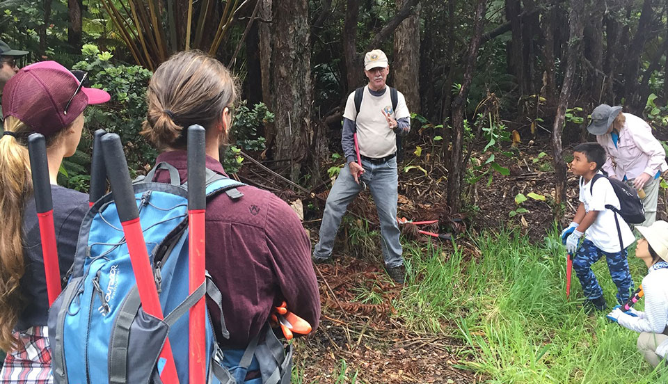Stewardship at the Summit leader Paul Field instructs volunteers on vegetation management