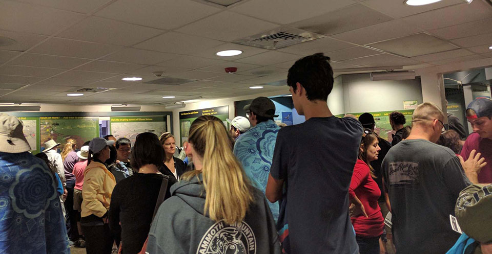 Visitors congregate at Kīlauea Visitor Center Thursday afternoon