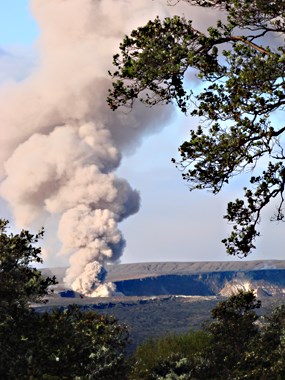 Fumes and ash billow from the vent within Halemaumau
