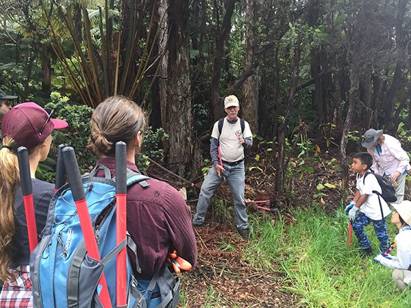 Paul Field instructs volunteers on vegetation management