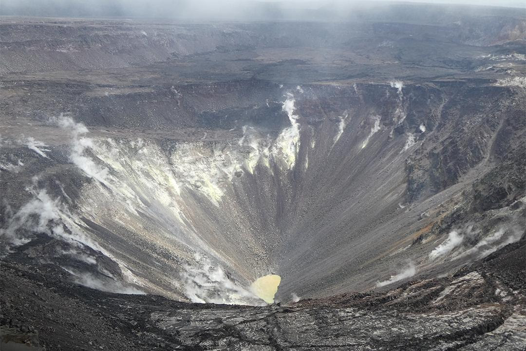 A small lake of water in a volcanic crater