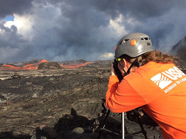 USGS Hawaiian Volcano Observatory scientist monitors Kīlauea Volcano's Lower East Rift Zone lava flow on 6/25/2018 USGS Hawaiian Volcano Observatory scientist monitors Kīlauea Volcano's Lower East Rift Zone lava flow on 6/25/2018