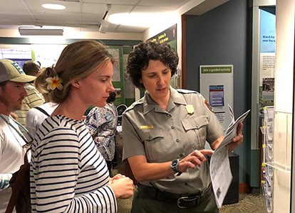 Ranger Benita assists visitors