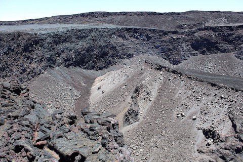 A volcanic crater on a sunny day