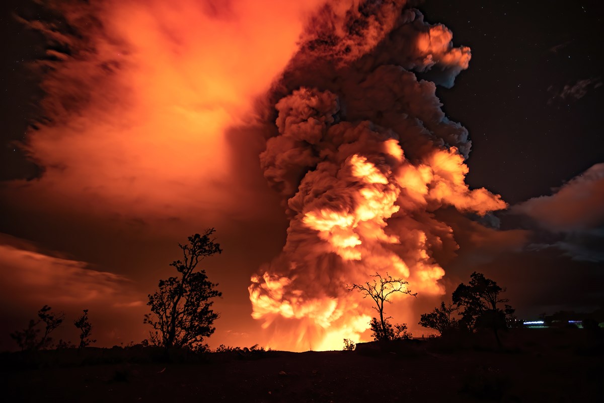 Glowing plume from an erupting volcanic crater