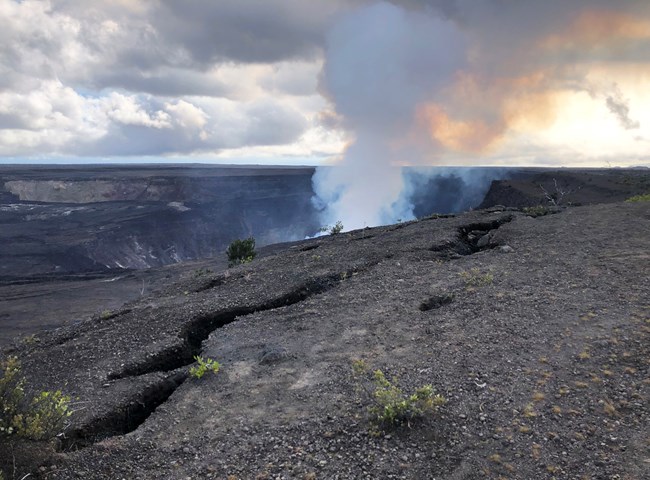 Cracks on the edge of an erupting volcanic caldera