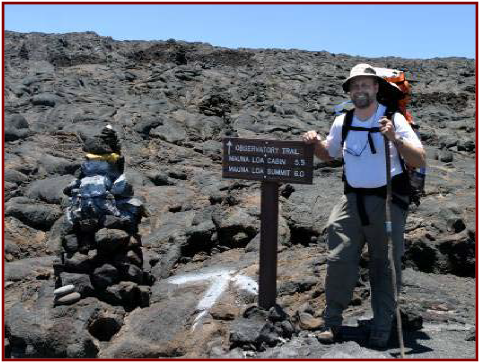 The author at the trail head completing the hike