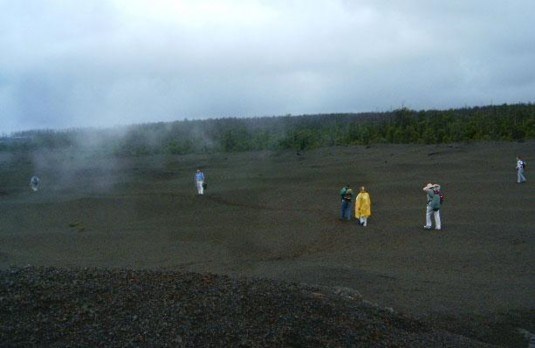 Trudging across the tephra in a drifting mist