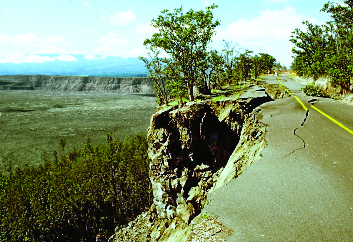 Damaged and collapsing road on the edge of a volcanic caldera