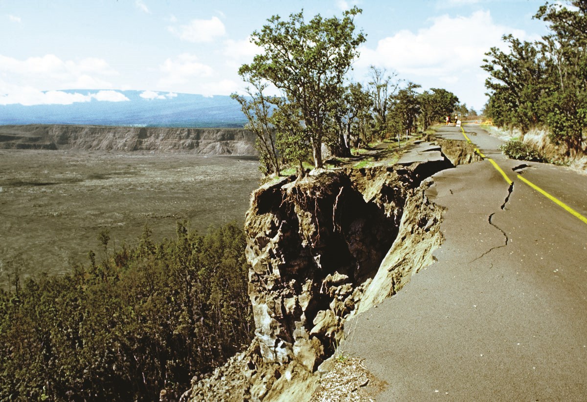 Damaged and collapsing road on the edge of a volcanic caldera
