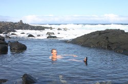 Drew floats in a tide pool.
