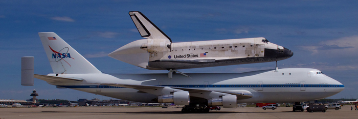 Starboard view of the Orbiter Discovery and the SCA on the tarmac at Dulles International Airport. Photographer, Thomas Behrens, HAER Architect, April 2012