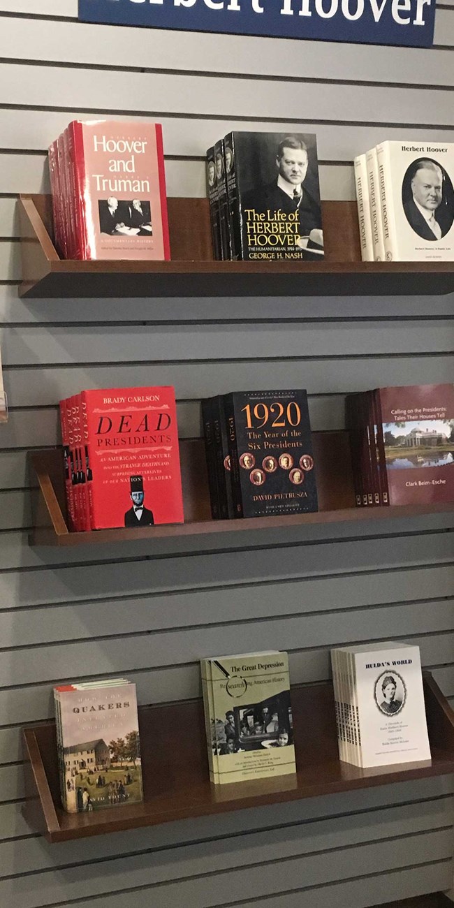 Bookstore in the Herbert Hoover NHS Visitor Center Books line the shelves on the wall of a bookstore.