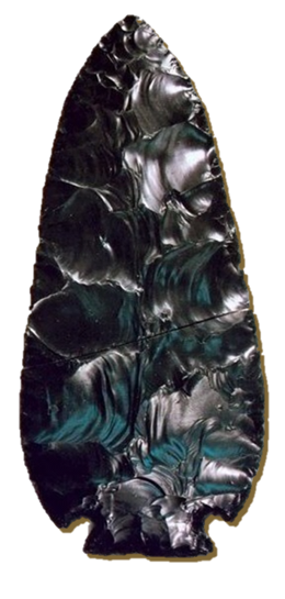 A black triangular-shaped spear point with point on the top and base on lower end.