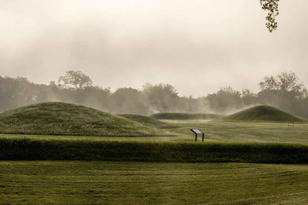 Morning sunrise at Mound City Group morning mist rising from earthen mounds.