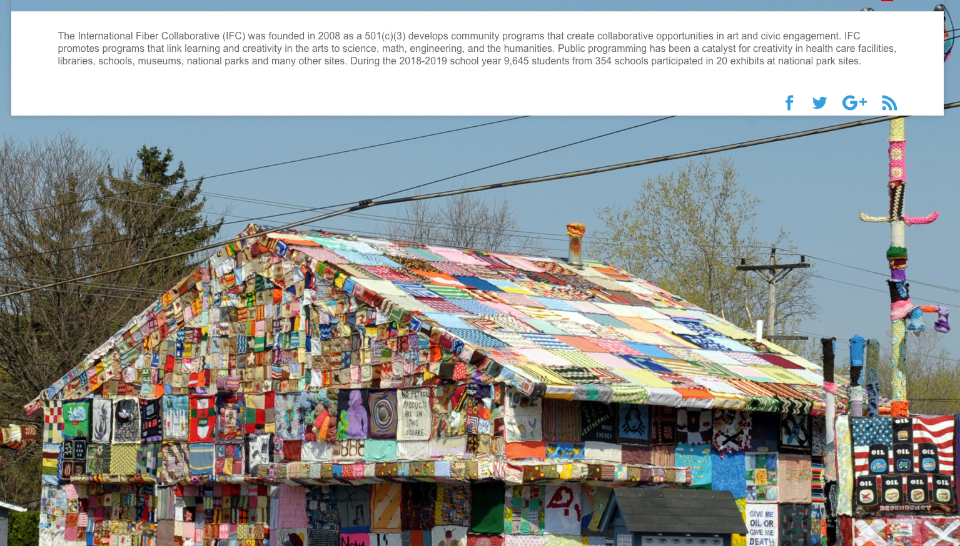 IFC A building covered in art and quilts over the entire outside of the structure