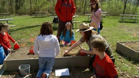 Junior archeologists learn from a park ranger at Junior Archeology Day! Junior archeologists learn from a park ranger at Junior Archeology Day!