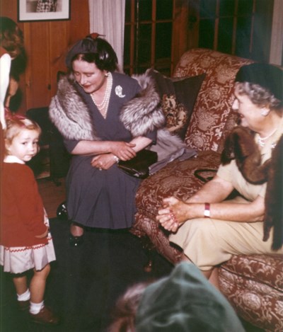 The Queen Mother seated on a sofa at Val-Kill Cottage