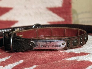 A leather collar with silver name plate engraved "Fala, The White House."