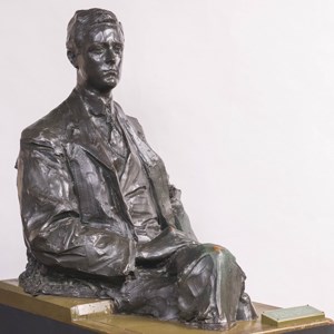 A life size bronze sculpture of FDR in three-quarter pose