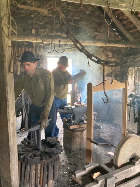 CCC at HOFU CCC reenactors working in blacksmith shop