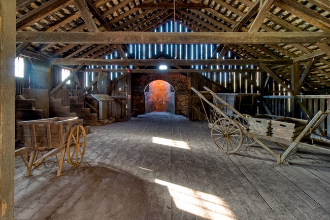 Slanted bridge house allowed for fillers to add raw materials to the top of the stone furnace stack.