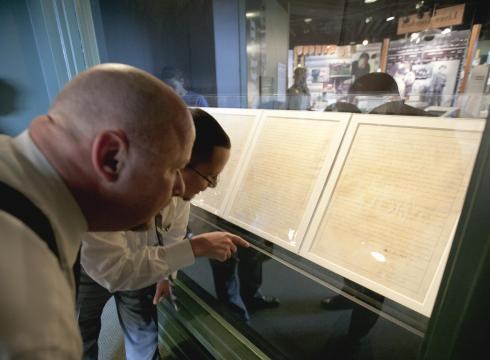 Visitors view the Homestead Act on special display at Homestead in 2012.