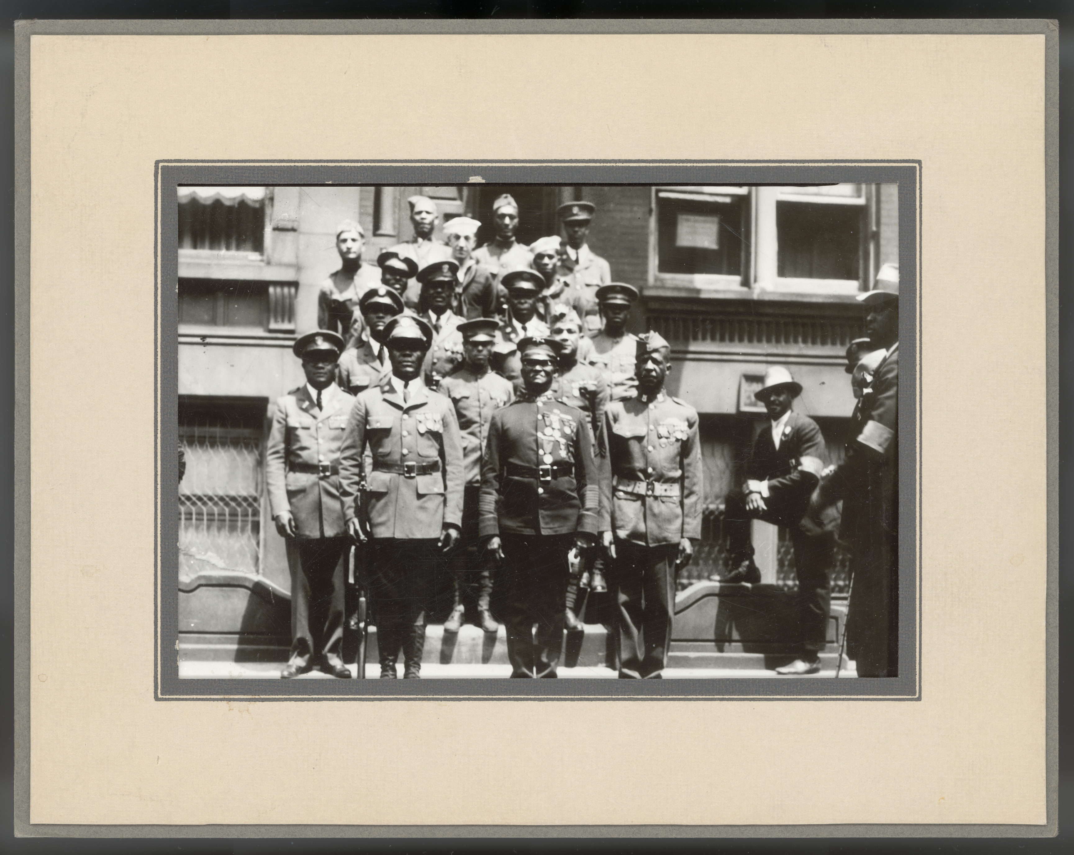 group of men in uniform outside a building