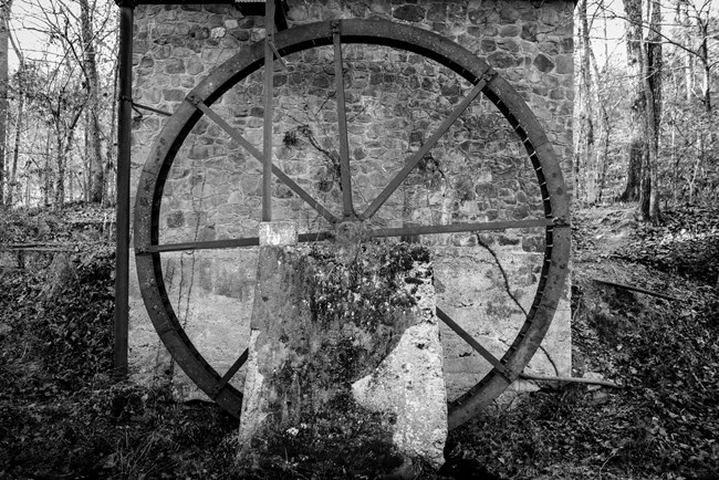 black and white image of water wheel