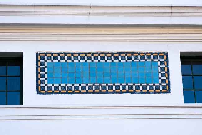 Close up of tiled architectural design on bathhouse