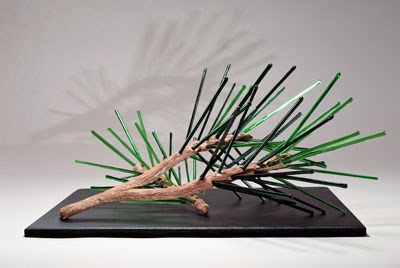 Art Glass "Pine Needles". Brown forked branch with medium and dark green "needles" that are glass rods. Art Glass "Pine Needles". Brown forked branch with medium and dark green "needles" that are glass rods.