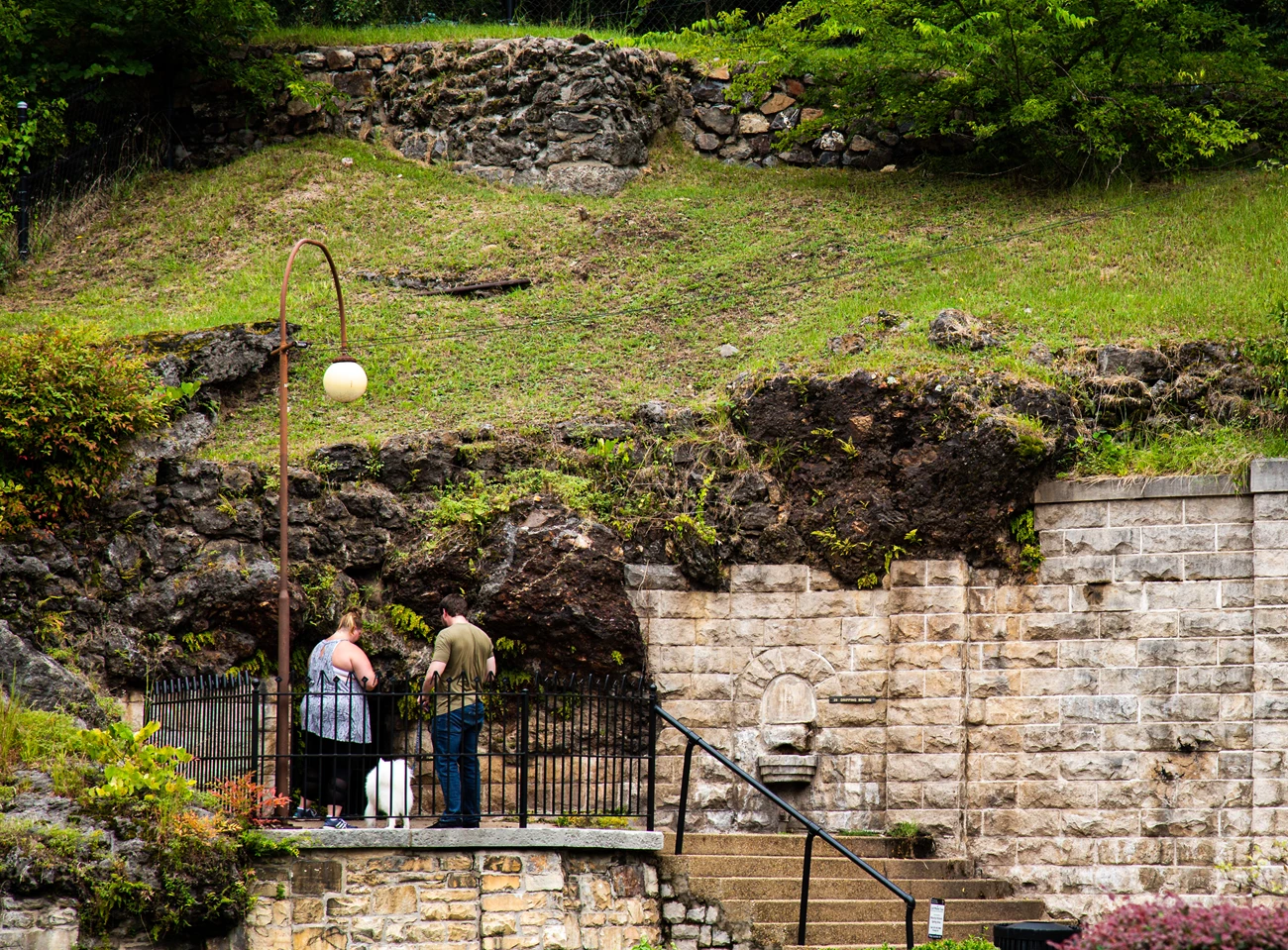 Display Spring A couple and their dog exploring the display spring